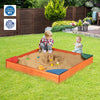 Kids playing in a colorful wooden sandbox with built-in corner seating, made of cedar and pine for outdoor fun.