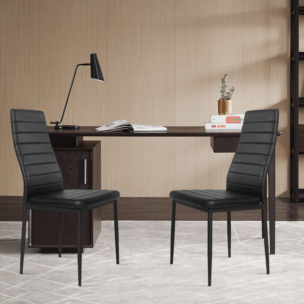Modern leather dining chairs set with metal frame, featuring ergonomic backrest and padded seats for comfort.