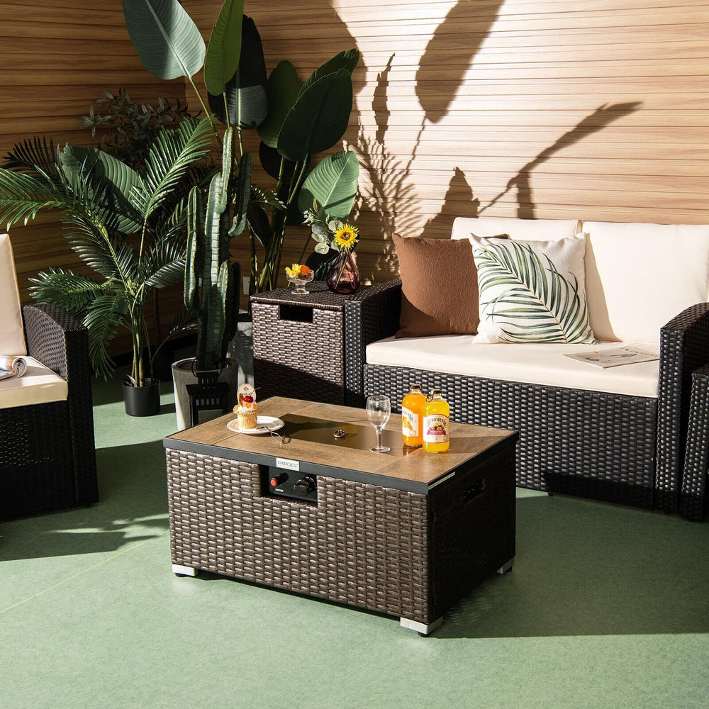 Rattan fire pit table set with propane tank holder, featuring a durable design for outdoor gatherings and warmth.