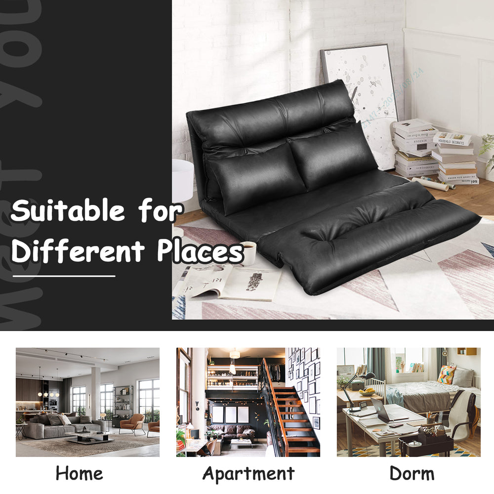 Foldable black PU leather leisure floor sofa bed with adjustable backrest and two pillows, ideal for small spaces.