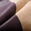 Close-up of the tan and brown waterproof garden table cover made from high-quality non-woven fabric for outdoor.