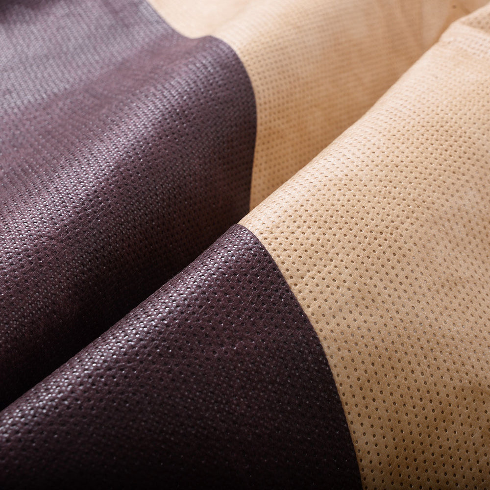 Close-up of the tan and brown waterproof garden table cover made from high-quality non-woven fabric for outdoor.