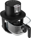 4.7 QT black glass air fryer with steam frying mode and six cooking presets for healthier, crispy meals.