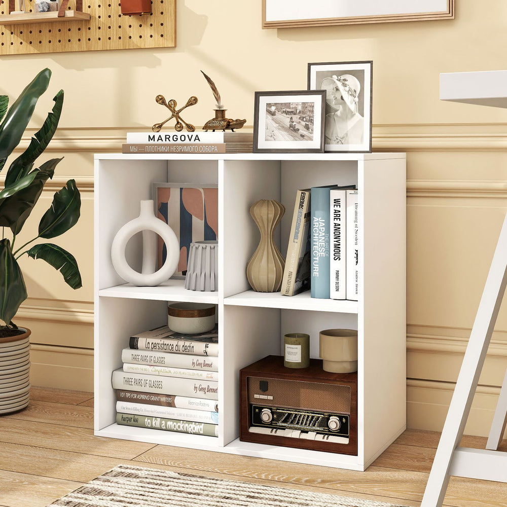 White 6-cube book shelf with modern design and smooth surface, perfect for displaying books and decor in any room.