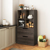 Tall gray 4-cube bookcase with 2 drawers, ideal for stylish storage in living room or office, featuring open shelves.
