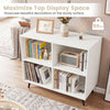White 4-cube wooden bookshelf with 5 metal legs, perfect for displaying decorations and organizing items in any room.