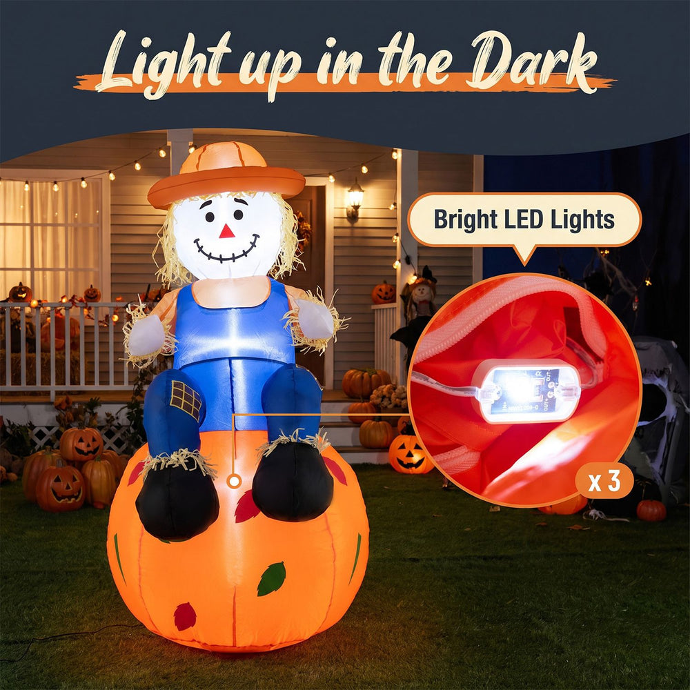 Cute 4 FT Halloween inflatable scarecrow on pumpkin with bright LED lights, perfect for festive indoor and outdoor displays.