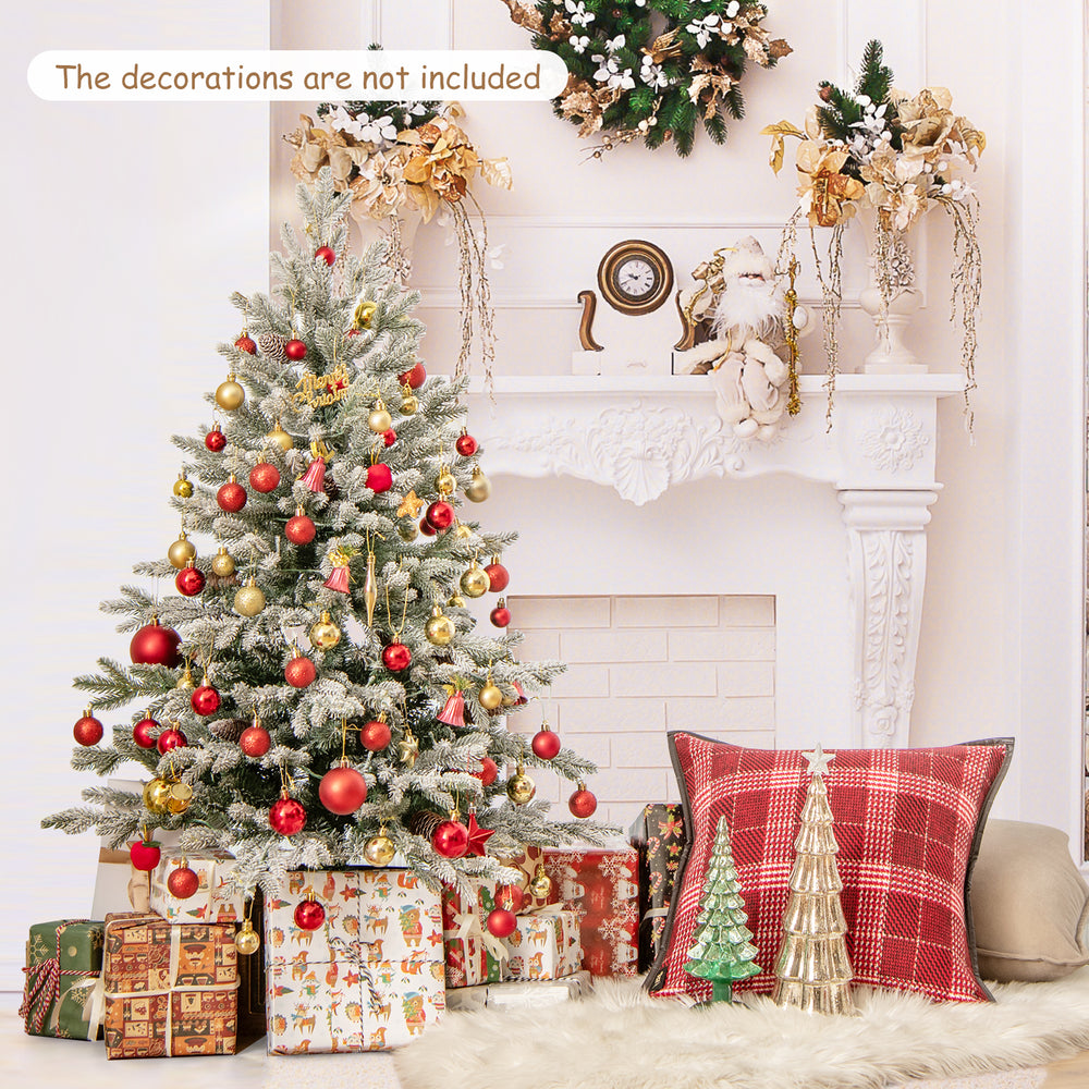 4 FT pre-lit artificial Christmas tree with 100 warm white LED lights, featuring snow flocked branches and pine cones.