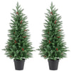 Two 4 FT pre-lit Christmas trees with 70 warm white LED lights and red berries, perfect for festive decor.