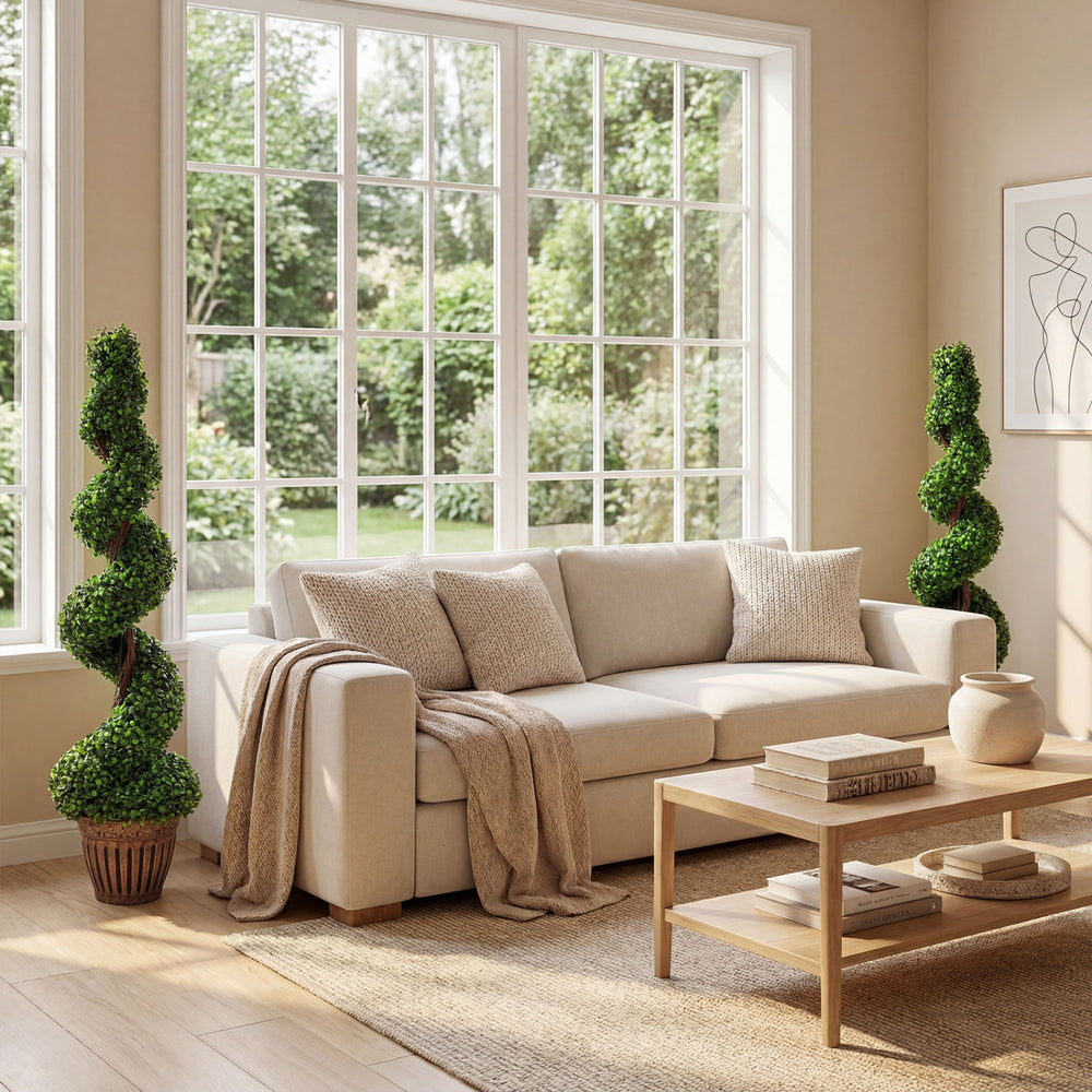 Chic 4 feet artificial boxwood spiral tree with lush green leaves in a weighted planter, perfect for indoor or outdoor decor.