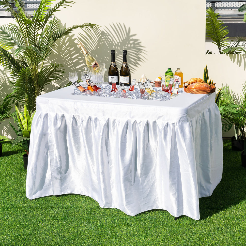 Folding ice bin table with skirt, spacious for chilled beverages, perfect for camping, picnics, or weddings.