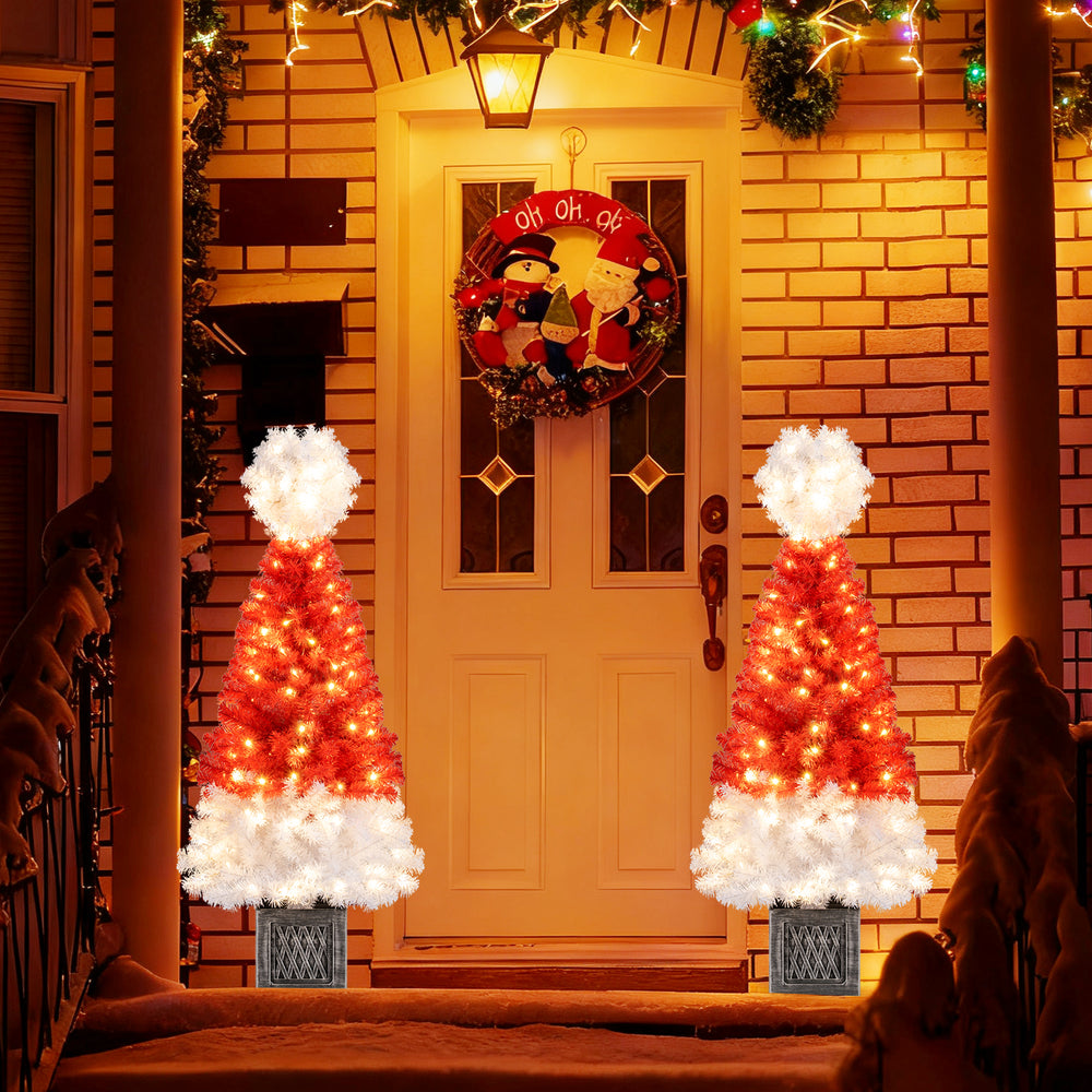 4 Ft artificial Christmas tree with Santa hat design, featuring a two-section build for easy assembly and storage.