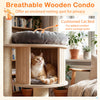Cushioned cat bed in a 68.5-inch wooden cat tree condo, offering comfort and a vantage point for relaxation.