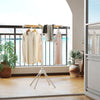 Foldable clothes drying rack with 8 bamboo rods, showcasing hanging garments on a balcony for convenient drying.