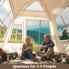 Spacious 4-person camping tent with automatic setup, rainfly, and dual doors for easy access in outdoor settings.