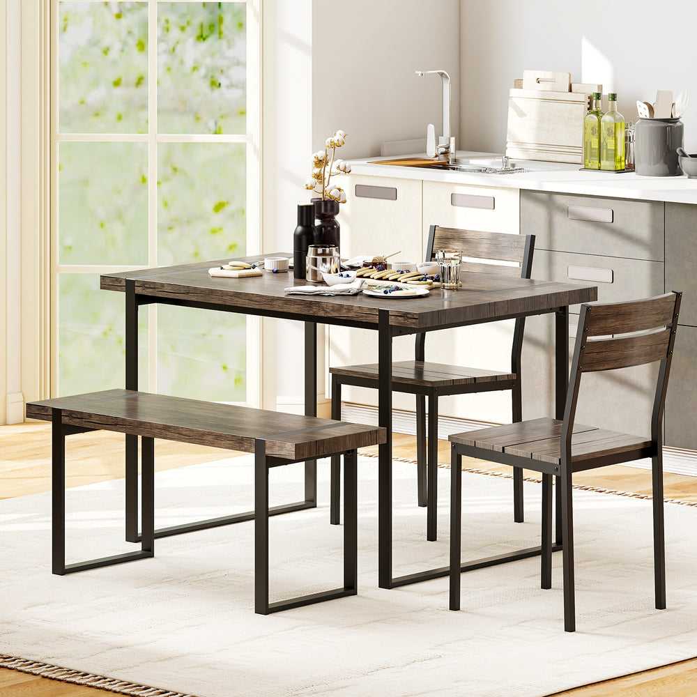Gray dining table set for 4 featuring a sleek bench and 2 chairs, ideal for compact dining areas and gatherings.