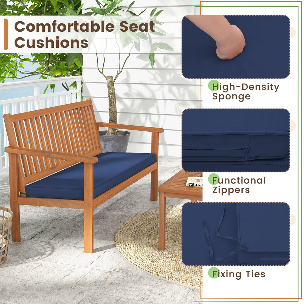 Navy padded seat cushions with fixing ties and zippers for the acacia wood loveseat in a patio setting.