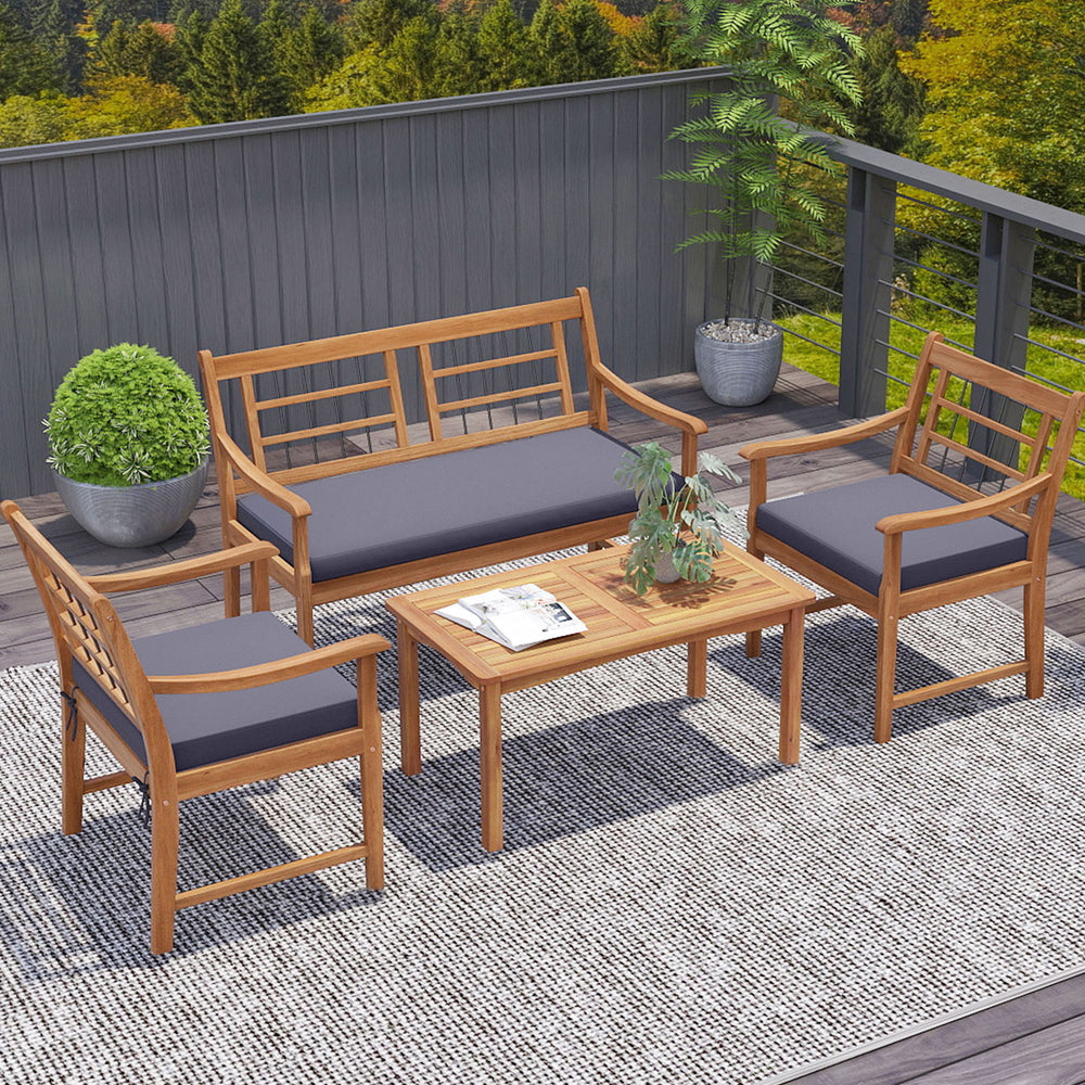 4-piece acacia wood patio furniture set with gray cushions, ideal for backyard relaxation and outdoor gatherings.