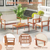 Patio furniture set featuring acacia wood chairs and table with white cushions, perfect for outdoor relaxation.