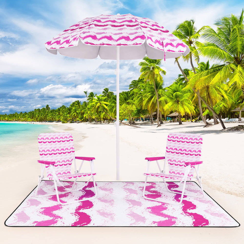 Beach umbrella set featuring pink chairs and a picnic blanket, perfect for sun protection and outdoor relaxation.