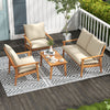 4-piece outdoor acacia wood conversation set with soft cushions, including loveseat and coffee table, perfect for patio.