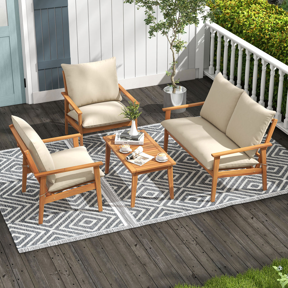 4-piece outdoor acacia wood conversation set with soft cushions, including loveseat and coffee table, perfect for patio.