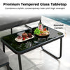 Tempered glass tabletop with rounded corners on a patio coffee table, perfect for outdoor relaxation and easy cleaning.