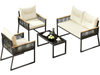 4-piece outdoor conversation set featuring a black tempered glass coffee table and cream cushions for patio relaxation.