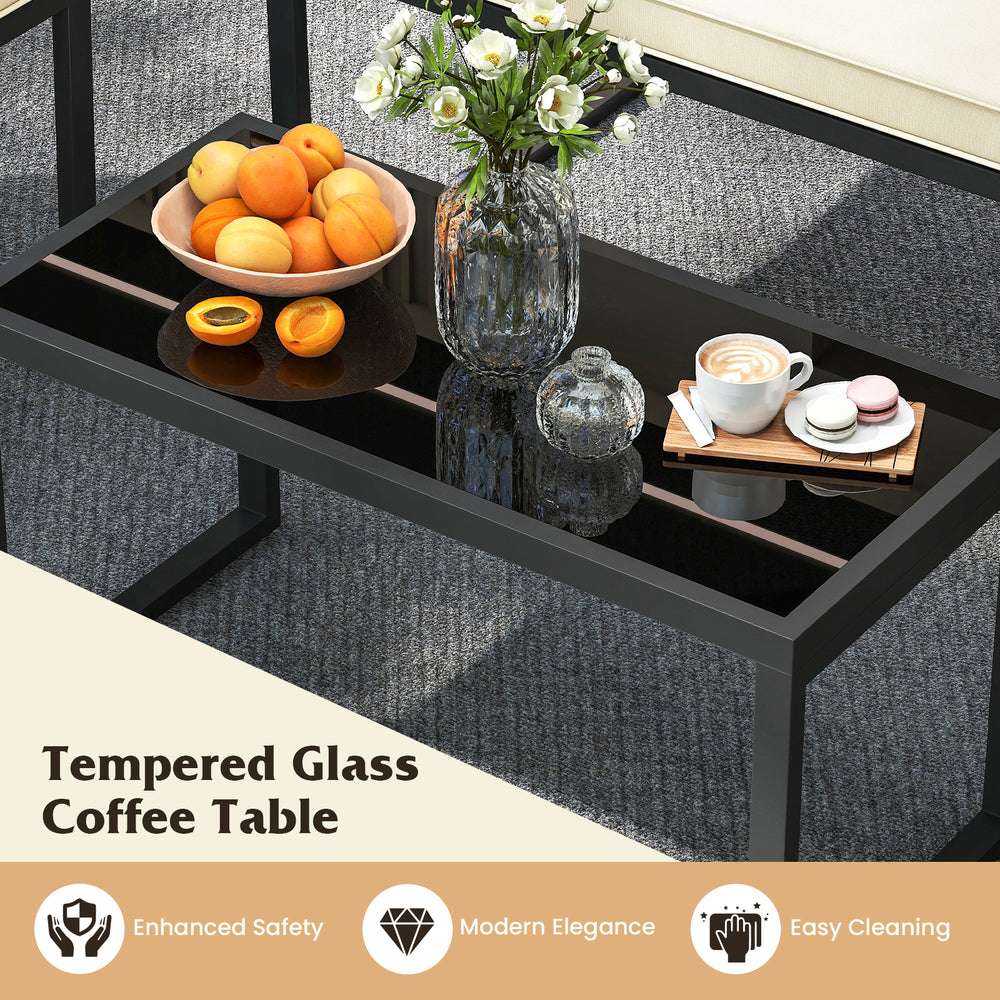 Tempered glass coffee table with black metal frame, perfect for outdoor patios and easy to clean.