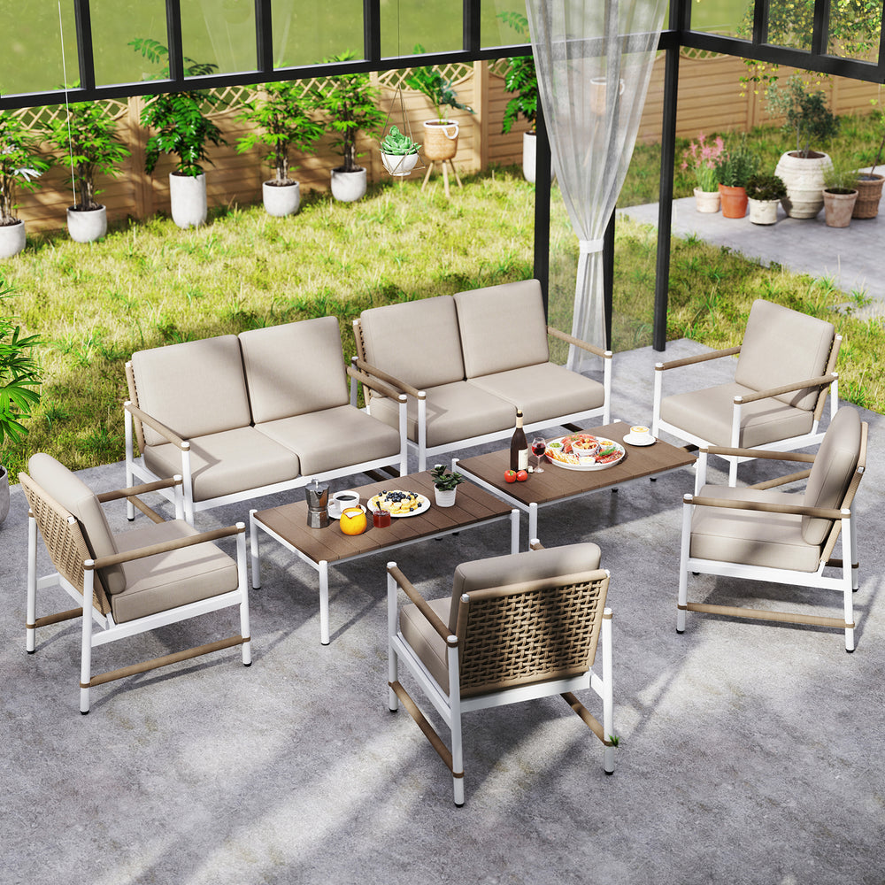 4-piece patio furniture set featuring gray thick cushions, woven PE rattan, and a slatted coffee table for outdoor.