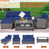4-piece patio rattan sofa set in navy with cushions and a coffee table, perfect for outdoor relaxation and gatherings.