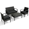 Patio rattan furniture set includes a loveseat, two single sofas, and a coffee table with cushions for outdoor relaxation.