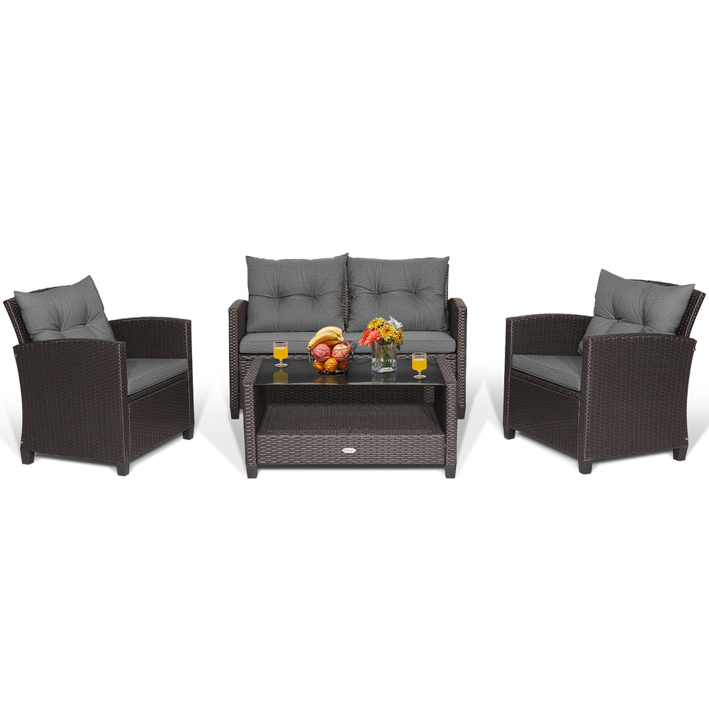 4-piece patio rattan conversation set with gray cushions, featuring a coffee table and ergonomic design for outdoor.