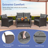 4-piece gray patio rattan furniture set featuring a coffee table, loveseat, and two single sofas for outdoor relaxation.