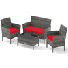 4-piece patio rattan conversation set with red cushions and tempered glass coffee table, ideal for backyard relaxation.