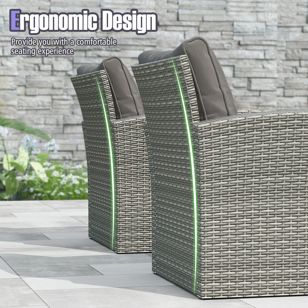 Side view of two ergonomic armchairs from a 4-piece patio rattan furniture set with gray cushions for outdoor comfort.