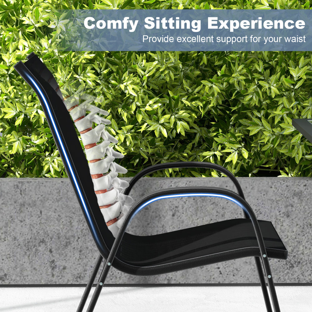 Side view of a stackable black patio dining chair showcasing ergonomic armrest and supportive incline backrest.