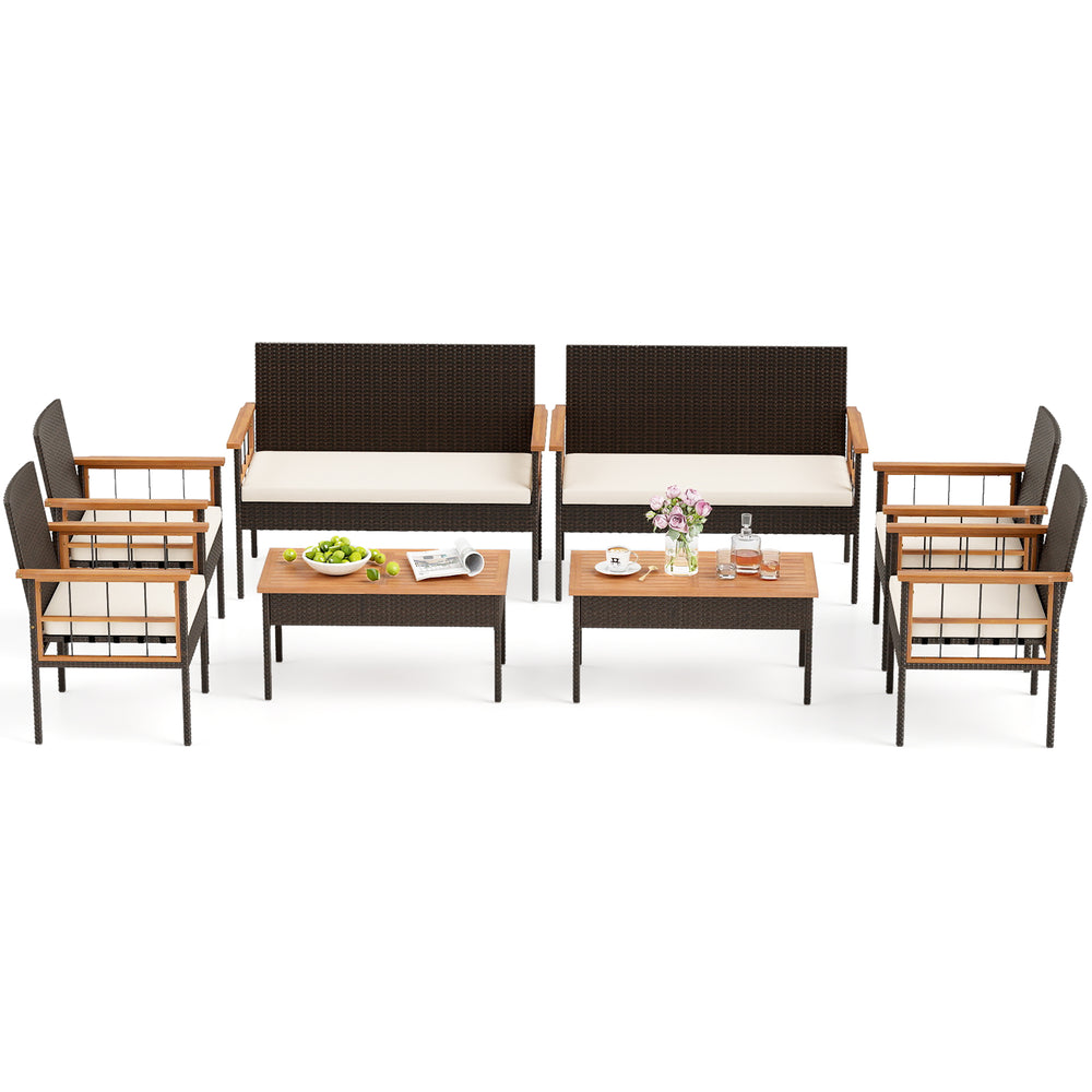 Side view of the 4-piece wicker furniture set showcasing handwoven PE rattan and soft cushions, ideal for outdoor.