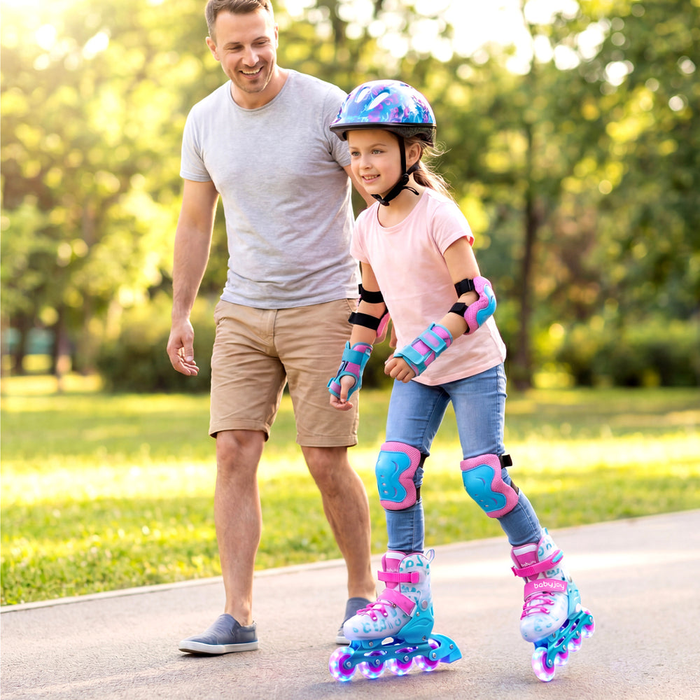 Kids inline skates in blue and pink with light-up wheels, adjustable for growth, perfect for fun outdoor skating.