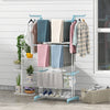 4-tier blue clothes drying rack with rotatable side wings and collapsible shelves, perfect for laundry and balcony use.