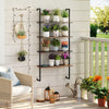4-tier industrial ladder bookshelf with a sturdy metal frame and wooden shelves, perfect for organizing decor in any.