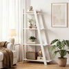 4-tier white wooden bookshelf with plants and decor, ideal for small spaces and versatile use in any room.