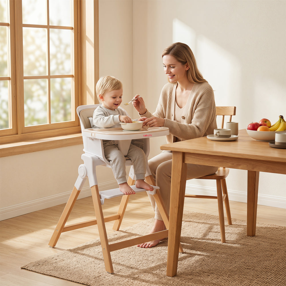 4-in-1 convertible baby high chair in beige with solid wood legs, adjustable tray, and 5-point safety belt for secure feeding.