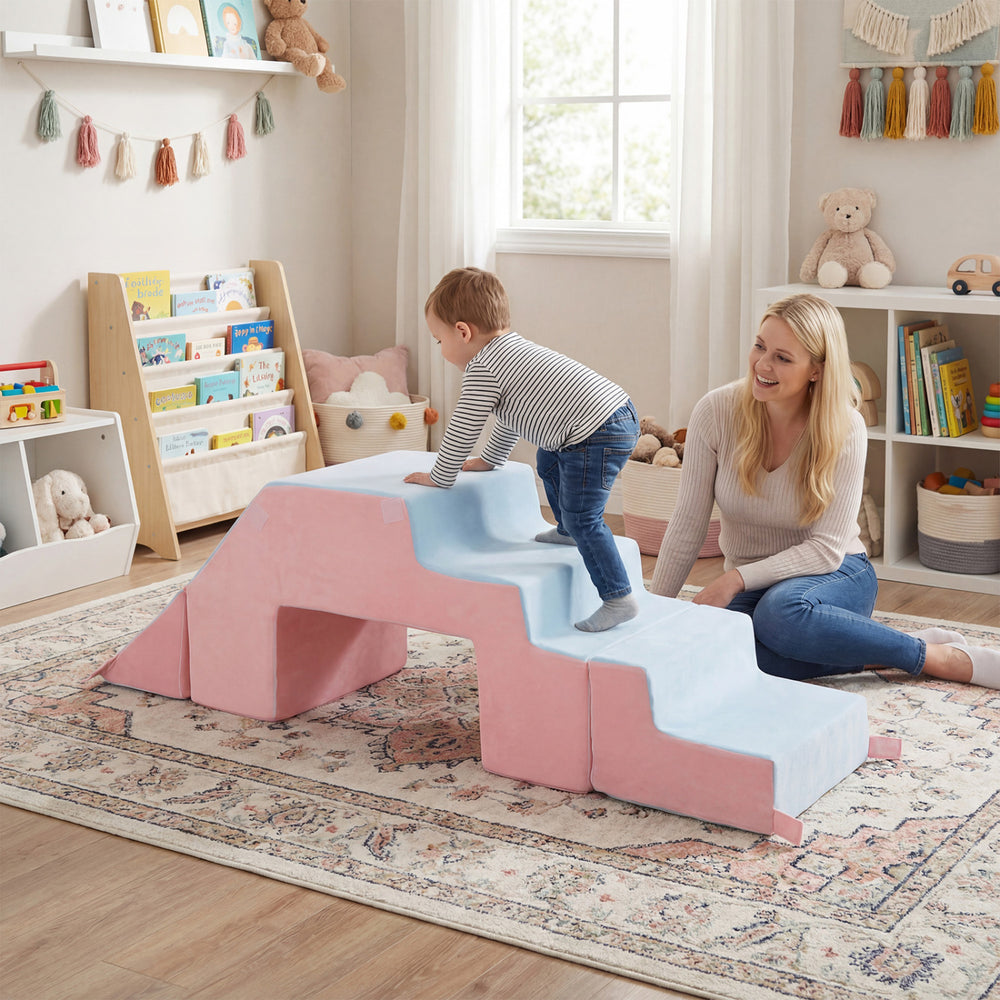 Colorful 4-in-1 foam climbing blocks in pink for toddlers, perfect for indoor climbing, sliding, and imaginative play.