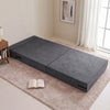 Gray 4-in-1 folding sofa bed with corduroy cover, shown in a flat position for versatile living room use.