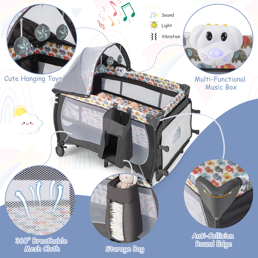 Portable baby nursery center with removable changing table, hanging toys, and music box for infants and toddlers.