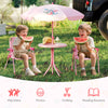Kids enjoying watermelon at a pink picnic set with adjustable umbrella and folding chairs, perfect for outdoor fun.