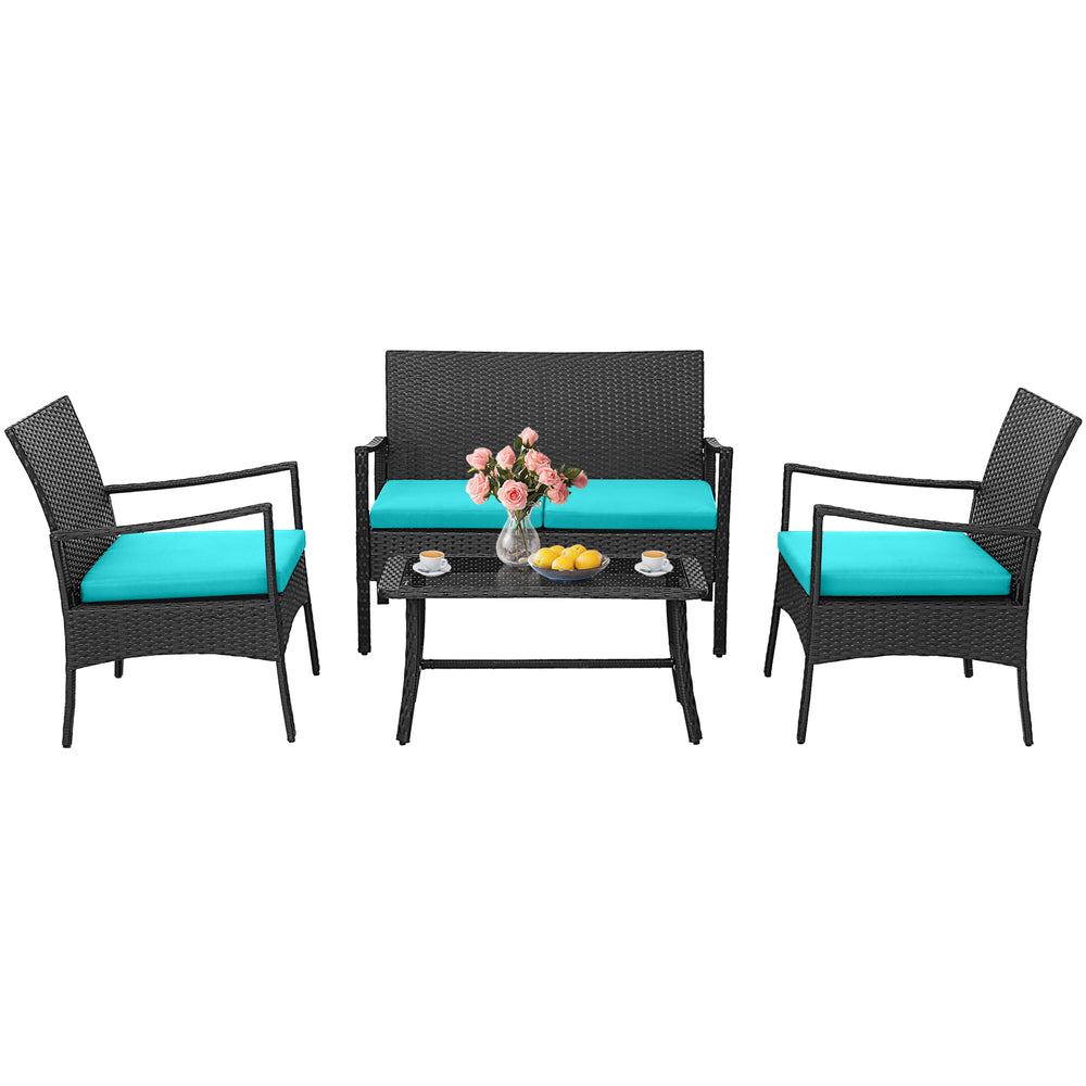 4-piece rattan conversation set with turquoise cushions, featuring a loveseat, two chairs, and a tempered glass coffee.