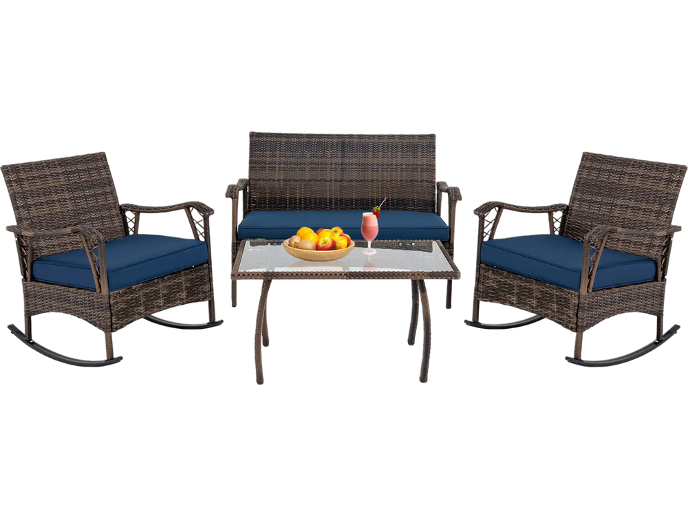 4-piece wicker rocking set with navy cushions, featuring a tempered glass coffee table, perfect for poolside relaxation.