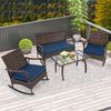4-piece wicker rocking set with navy cushions, tempered glass table, perfect for backyard or porch relaxation.